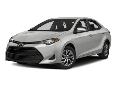 2018 Toyota Corolla LE in Classic Silver Metallic — front three-quarter view