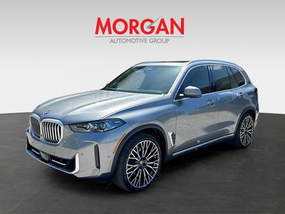 2024 BMW X5 — rear three-quarter view