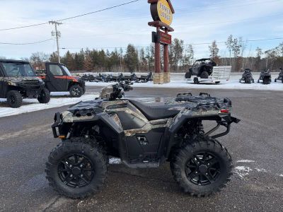 2026 Polaris Sportsman 850 Trail A26SXZ85A9 in Polaris Pursuit Camo — front three-quarter view