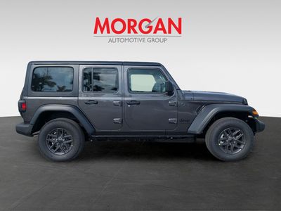2026 Jeep Wrangler — rear three-quarter view
