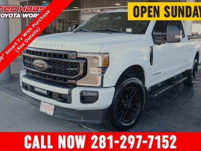 2020 Ford Super Duty F-250 4WD LARIAT 6.7T Diesel in Oxford White — front three-quarter view