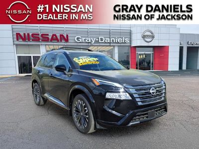 2025 Nissan Rogue Platinum in Super Black — front three-quarter view