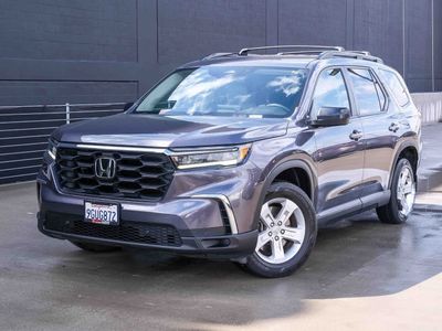 2023 Honda Pilot LX — front three-quarter view