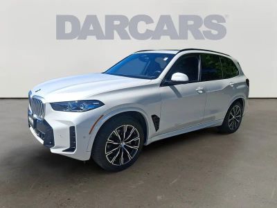 2026 BMW X5 — rear three-quarter view