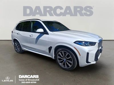 2026 BMW X5 xDrive40i in White Metallic — front three-quarter view
