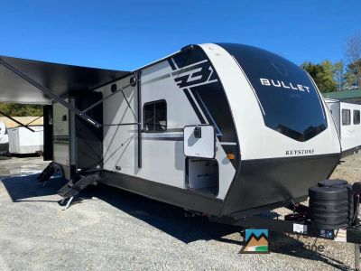 2026 Keystone RV Bullet 330BKQ — front three-quarter view
