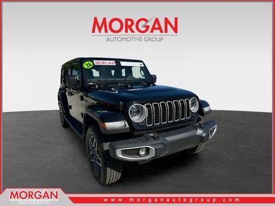 2026 Jeep Wrangler Sahara in Black Clearcoat — front three-quarter view