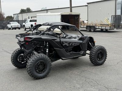 2026 Can-Am Maverick X3 X rs Turbo RR Triple Black_7.6 in. — rear three-quarter view