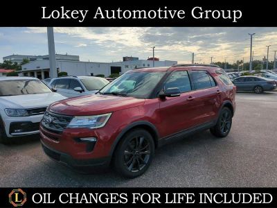 2018 Ford Explorer XLT in Ruby Red Metallic — front three-quarter view