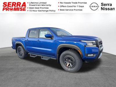 2026 Nissan Frontier PRO-4X in Bluestone Pearl — front three-quarter view