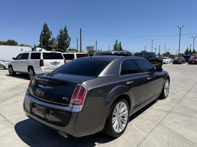 2014 Chrysler 300 — rear three-quarter view