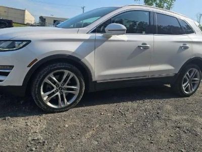 2019 Lincoln MKC Reserve in White — front three-quarter view