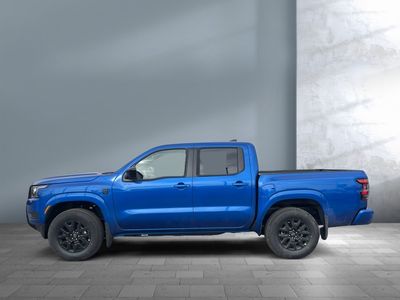 2026 Nissan Frontier — rear three-quarter view