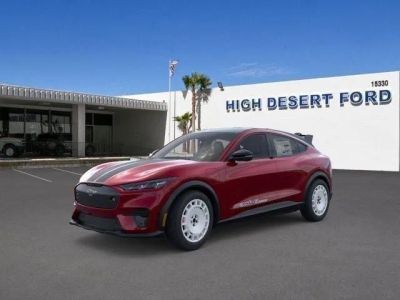 2025 Ford Mustang Mach-E GT in Molten Magenta Metallic Tinted Clearcoat — front three-quarter view