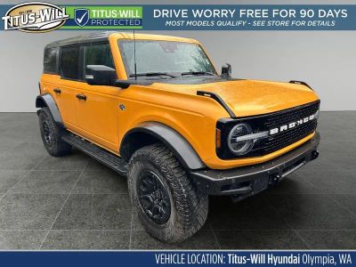 2022 Ford Bronco Wildtrak in Orange Metallic — front three-quarter view