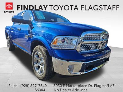 2016 RAM 1500 Laramie in Blue Streak Pearlcoat — front three-quarter view