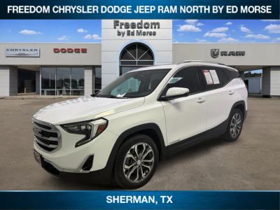 2019 GMC Terrain SLT in Summit White — front three-quarter view