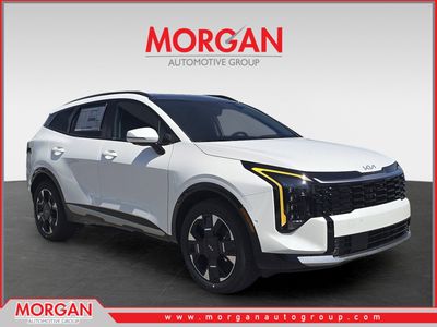 2026 Kia Sportage Hybrid SX-Prestige in Snow White Pearl — front three-quarter view