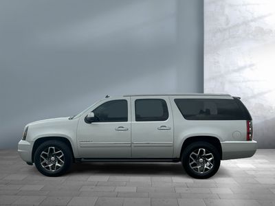 2011 GMC Yukon XL — rear three-quarter view