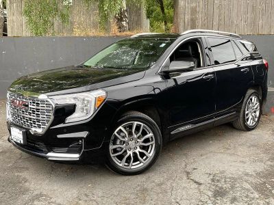 2022 GMC Terrain Denali in Ebony Twilight Metallic — front three-quarter view