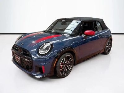 2026 MINI CONVERTIBLE ICONIC in Indigo Sunset Blue Metallic — front three-quarter view