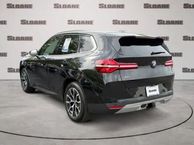 2026 BMW X3 — rear three-quarter view