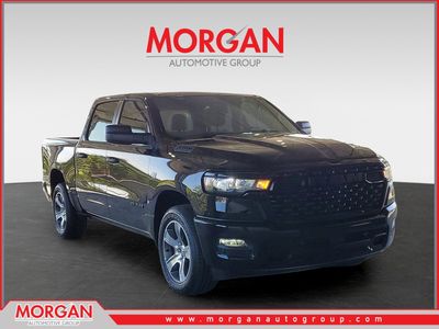 2026 Ram 1500 Express in Diamond Black Crystal Pearlcoat — front three-quarter view