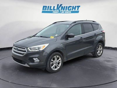 2018 Ford Escape SEL in Magnetic — front three-quarter view