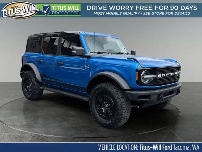 2024 Ford Bronco Wildtrak in Blue Metallic — front three-quarter view