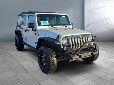 2016 Jeep Wrangler Unlimited — front three-quarter view