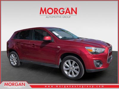 2015 Mitsubishi Outlander Sport ES in Red — front three-quarter view