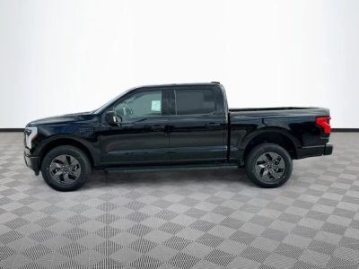 2025 Ford F-150 Lightning — rear three-quarter view