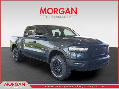2026 Ram 1500 Rebel in Forged Blue Metallic — front three-quarter view