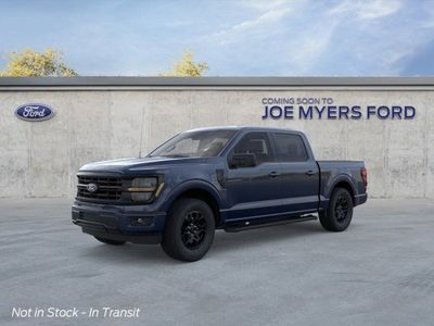 2026 Ford F-150 in HX Blue — front three-quarter view