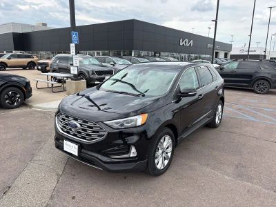 2020 Ford Edge Titanium in Black — front three-quarter view