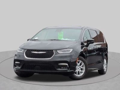 2024 Chrysler Pacifica Touring L in Brilliant Black Crystal Pearlcoat — front three-quarter view