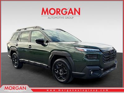 2026 Subaru Outback Limited in Deep Emerald Green Pearl — front three-quarter view