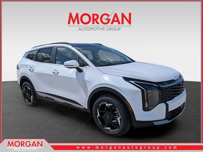 2026 Kia Sportage EX in Glacial White Pearl — front three-quarter view