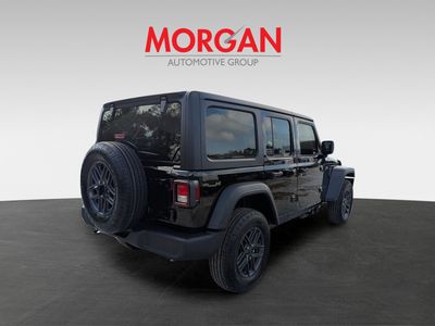 2026 Jeep Wrangler — rear three-quarter view