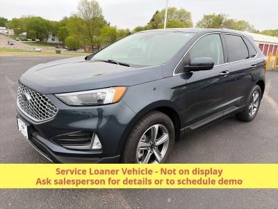 2024 Ford Edge SEL AWD in Stone Blue Metallic — front three-quarter view