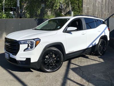 2022 GMC Terrain SLE in Summit White — front three-quarter view