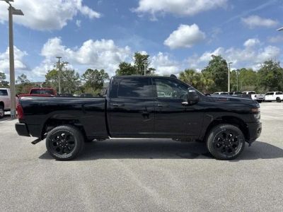 2026 RAM 2500 Big Horn in Diamond Black Crystal Pearlcoat — front three-quarter view