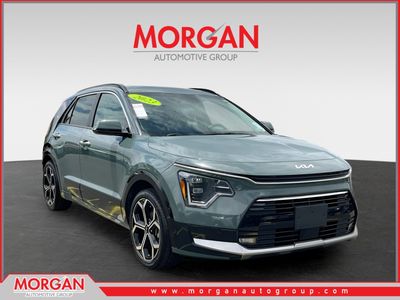 2023 Kia Niro SX Touring in Green — front three-quarter view
