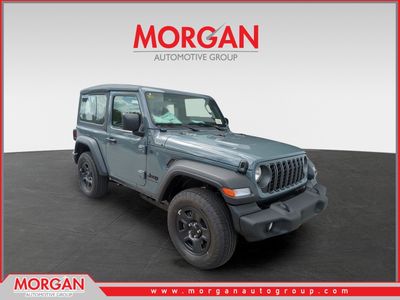 2026 Jeep Wrangler Sport in Gray — front three-quarter view