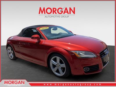 2011 Audi TT 2.0T Prestige in Volcano Red Metallic/Black Roof — front three-quarter view
