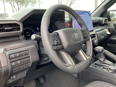2026 Toyota Tacoma TRD Off Road in Bronze Oxide — front three-quarter view