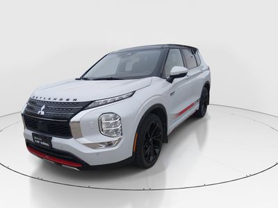 2024 Mitsubishi Outlander Plug-In Hybrid — rear three-quarter view