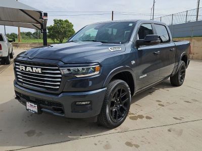 2026 RAM 1500 Laramie in Forged Blue Metallic — front three-quarter view