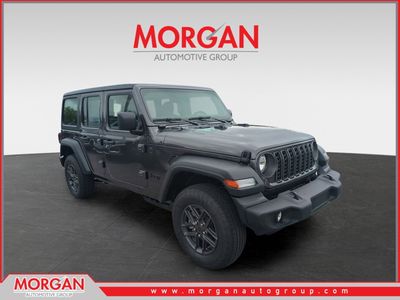 2026 Jeep Wrangler Sport in Gray — front three-quarter view