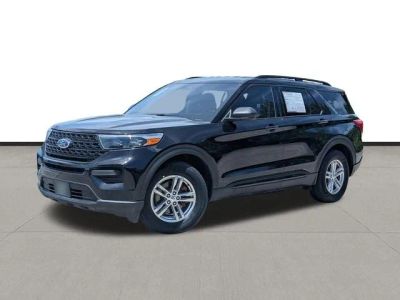2022 Ford Explorer XLT in Black Metallic — front three-quarter view